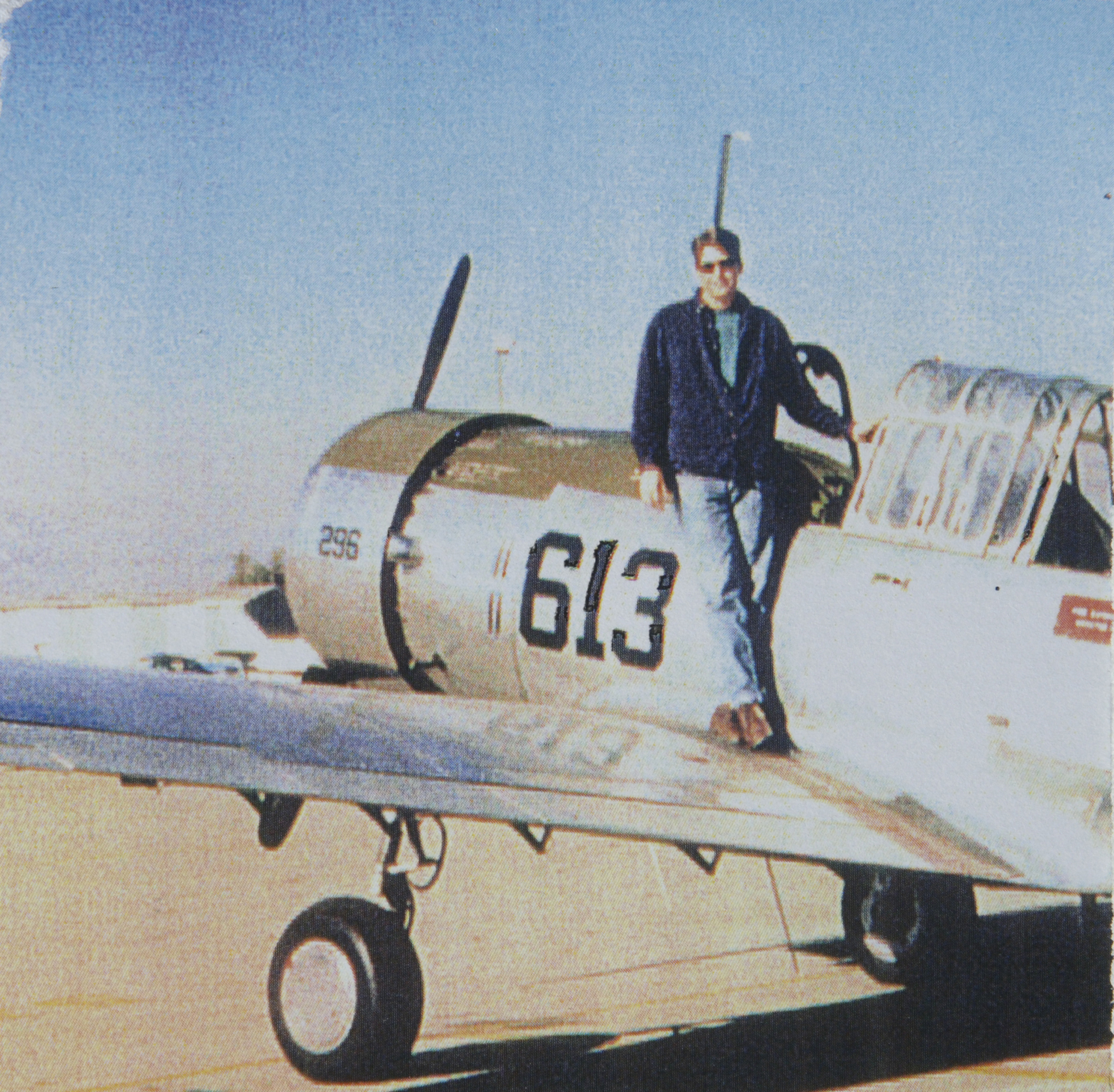 young man on wing of world war two wwii era aircraft airplane